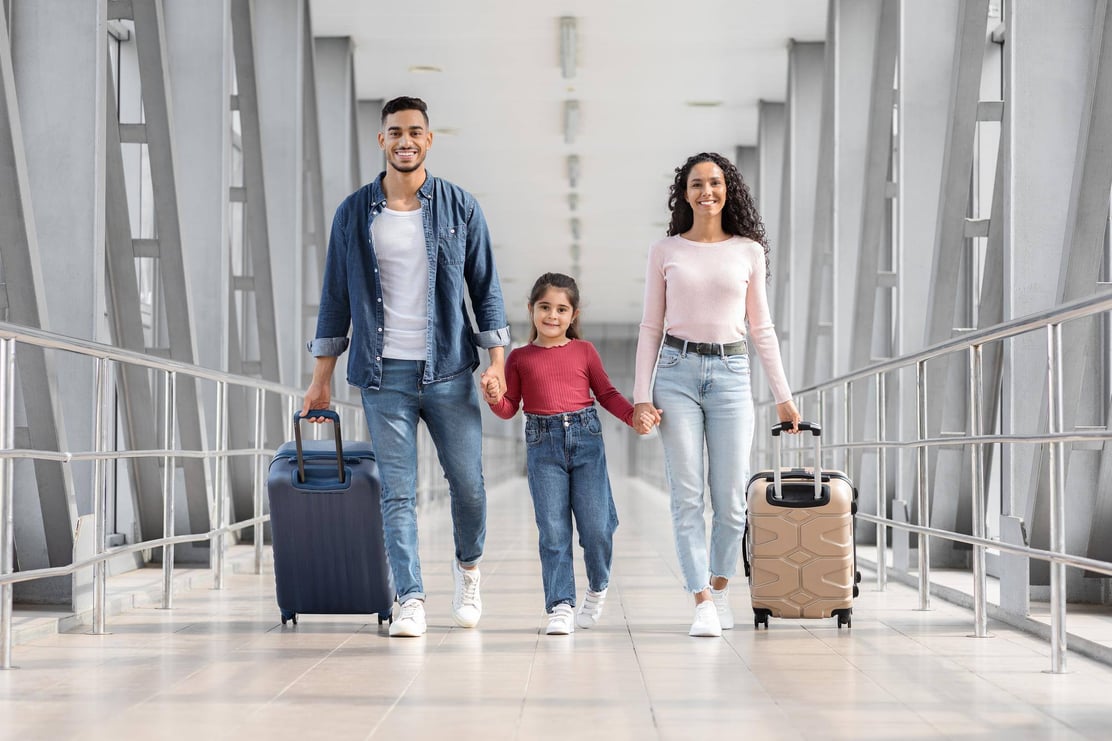 ready-vacation-happy-middle-eastern-family-walking-with-suitcases-airport-terminal